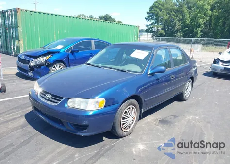 2002 Toyota Corolla Le из США, поврежденный, VIN 2T1BR12E52C558044